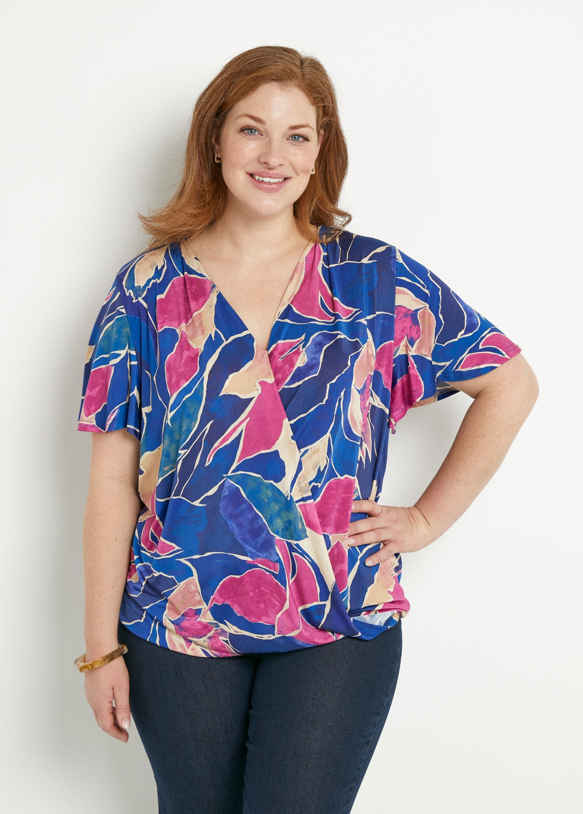 Long_floral_pattern_blousant_wrap-over_t-shirt_Blue_and_pink_FA1_curvy